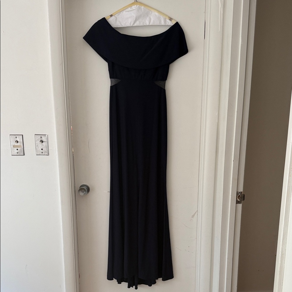 Elegant Navy Xscape Off-Shoulder Dress with mesh sides and slit up the middle